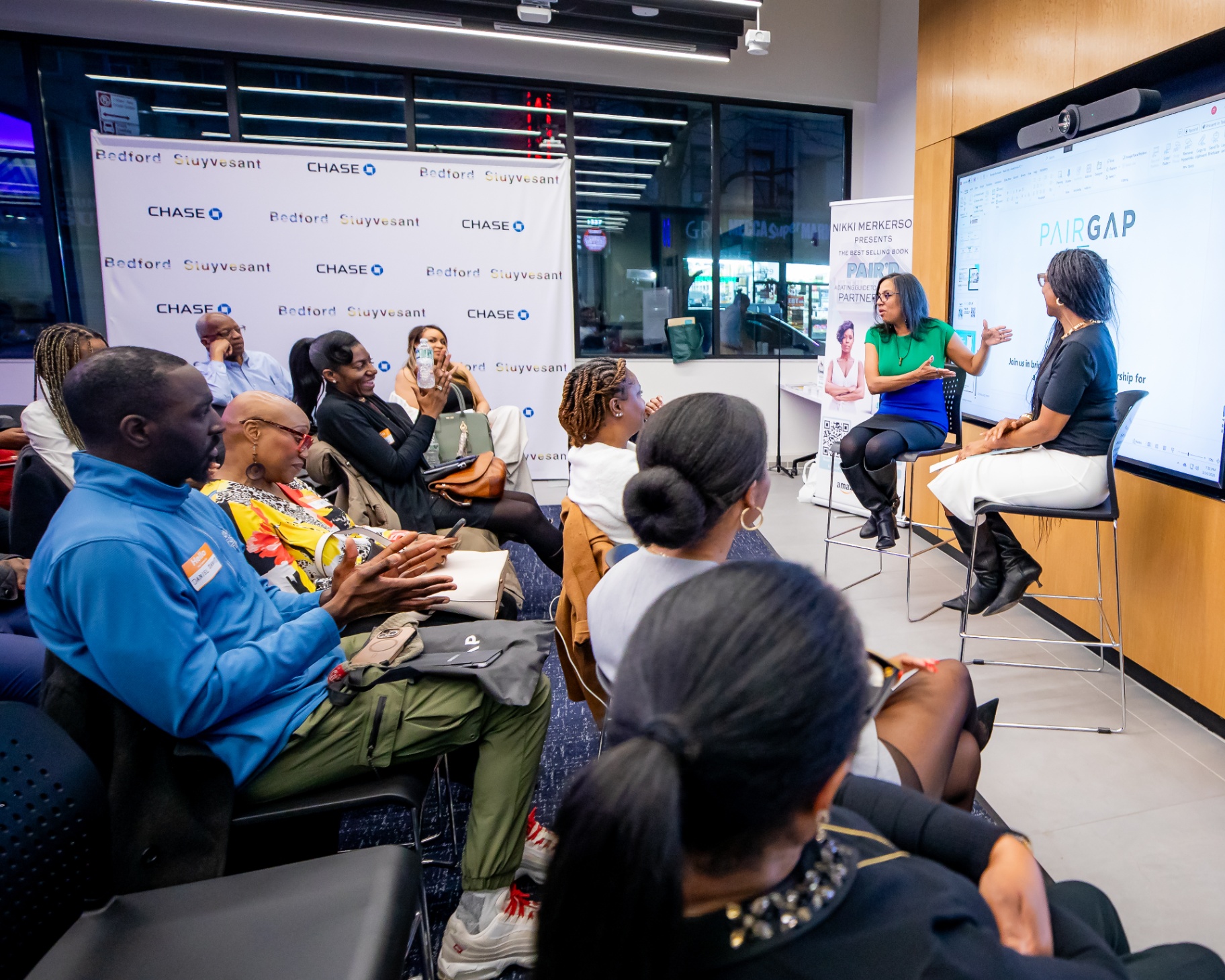 Real estate agent speaking to attendees at a Pairgap Live event